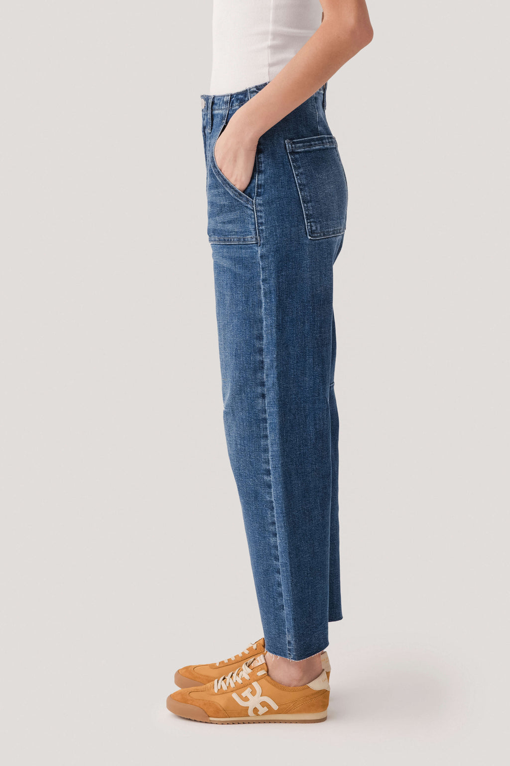 Dark wash utility pocket barrel jeans, front patch pocket and wide barrel leg