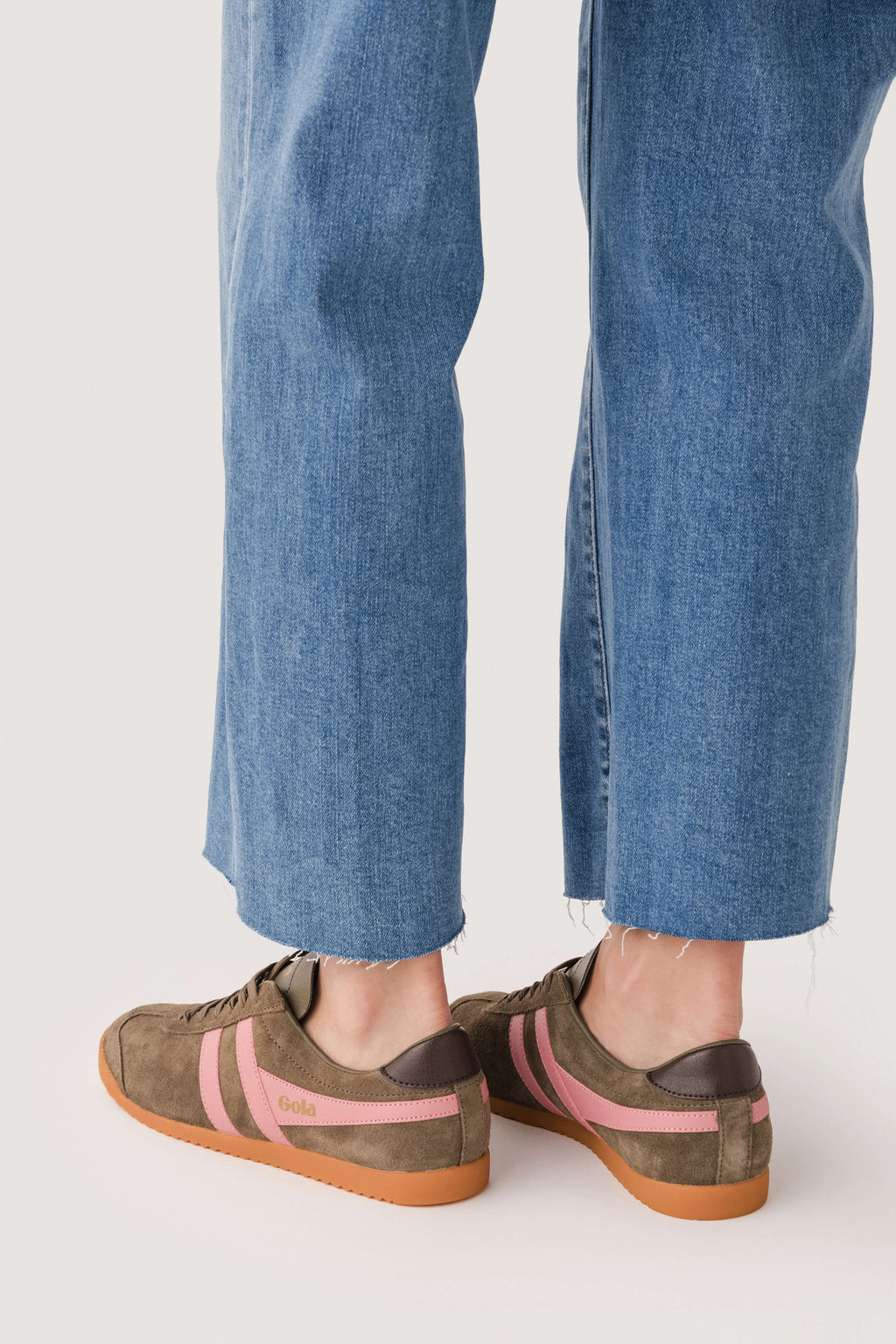 Gola suede sneakers with coral-pink stripe detailing and gum sole; rear view