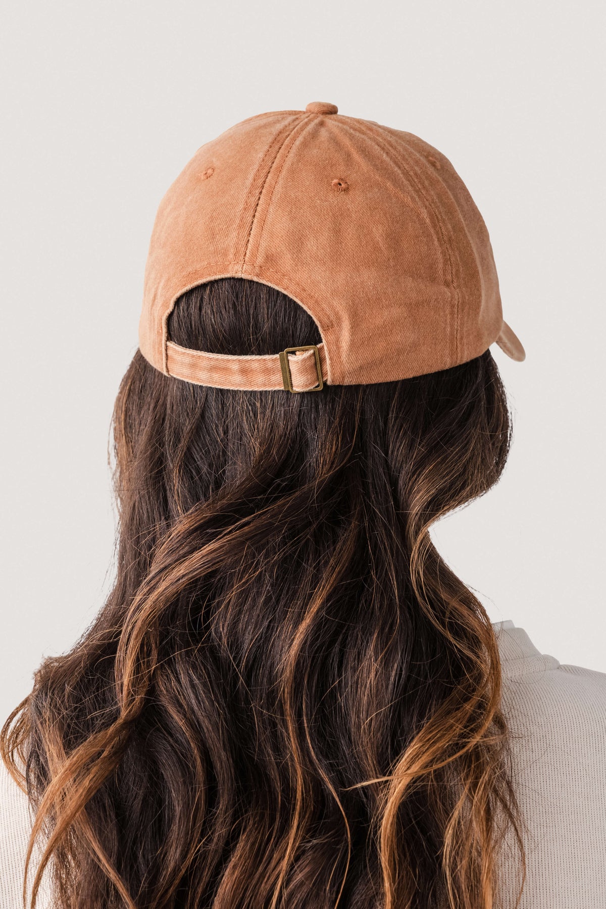 Amber orange classic baseball cap with adjustable back strap and curved brim