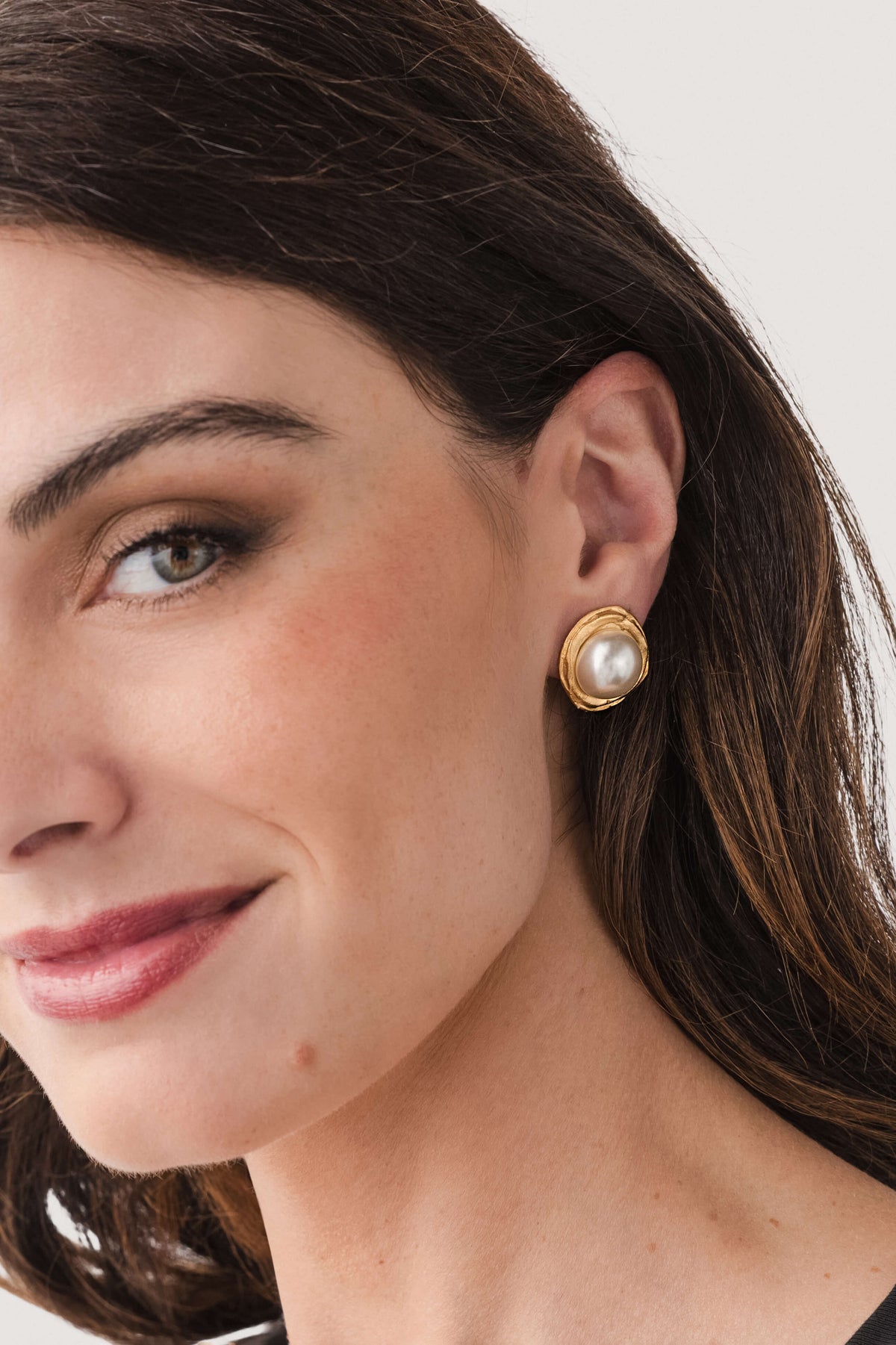 Gold-tone hoop earrings with round pearl stud, small halo style