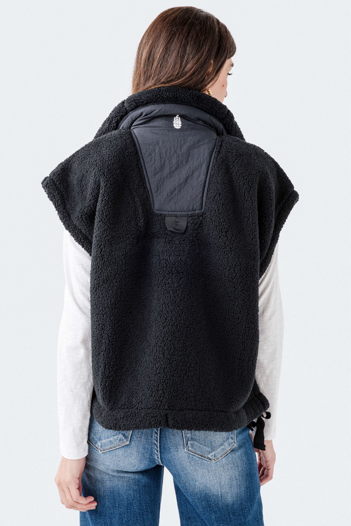 Black fleece vest with stand collar and large back patch pocket