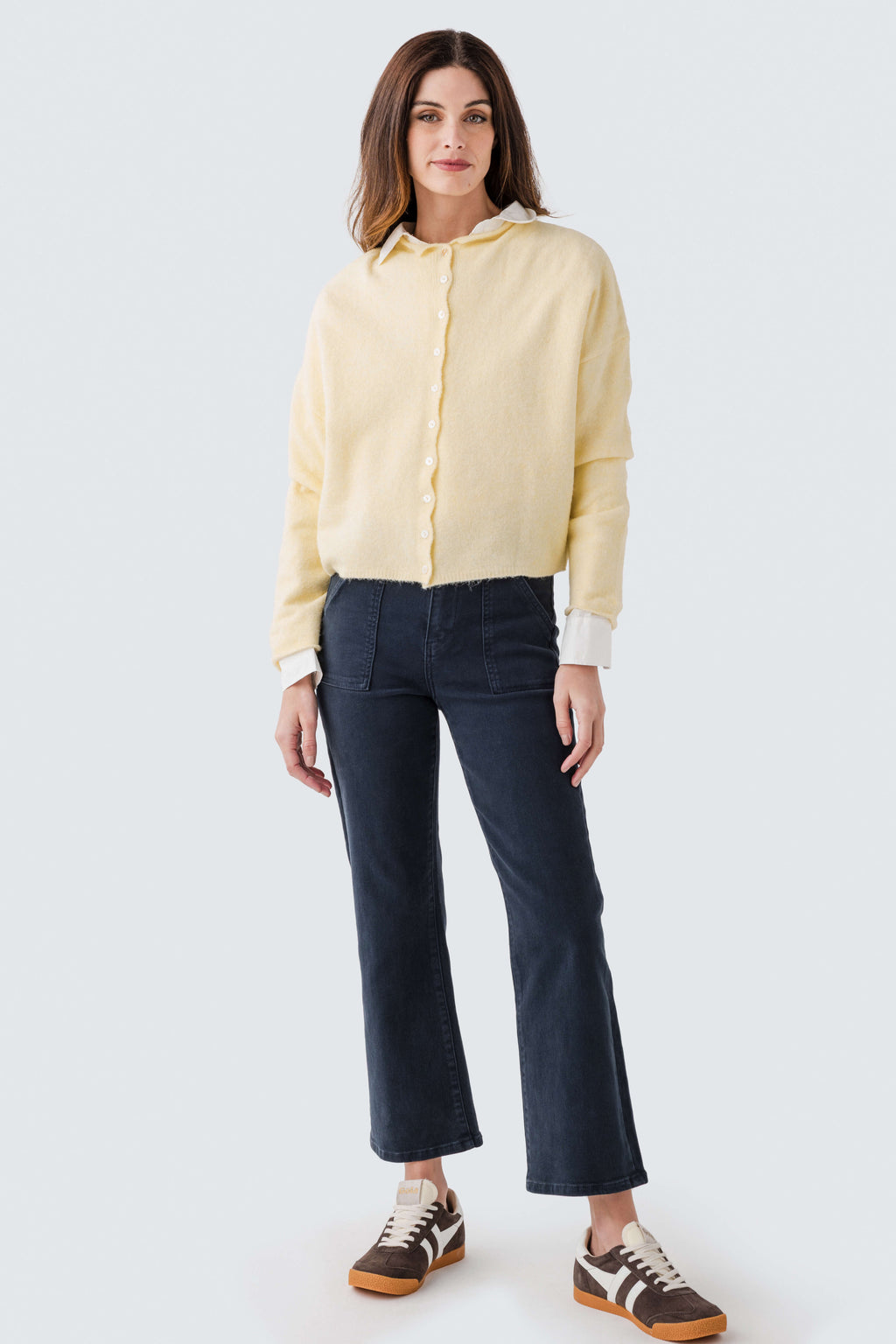 Deep navy ankle flare jeans front view with straight-to-flare silhouette