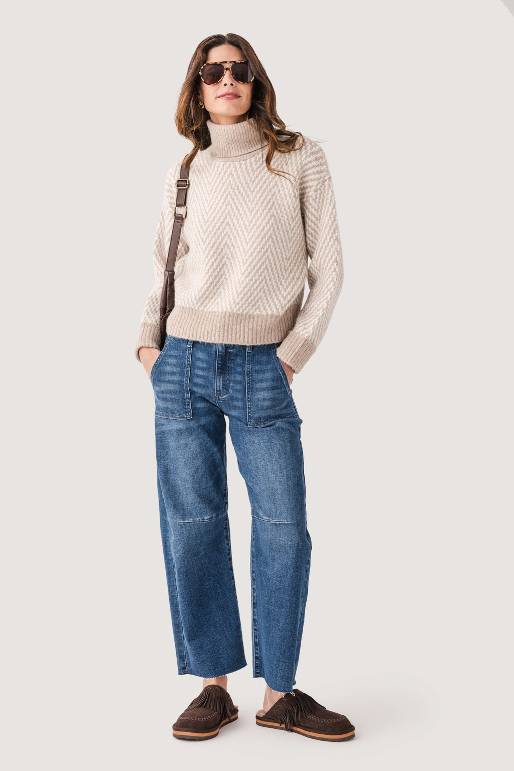 Dark wash barrel jeans with utility patch pockets, mid-rise waist and wide leg