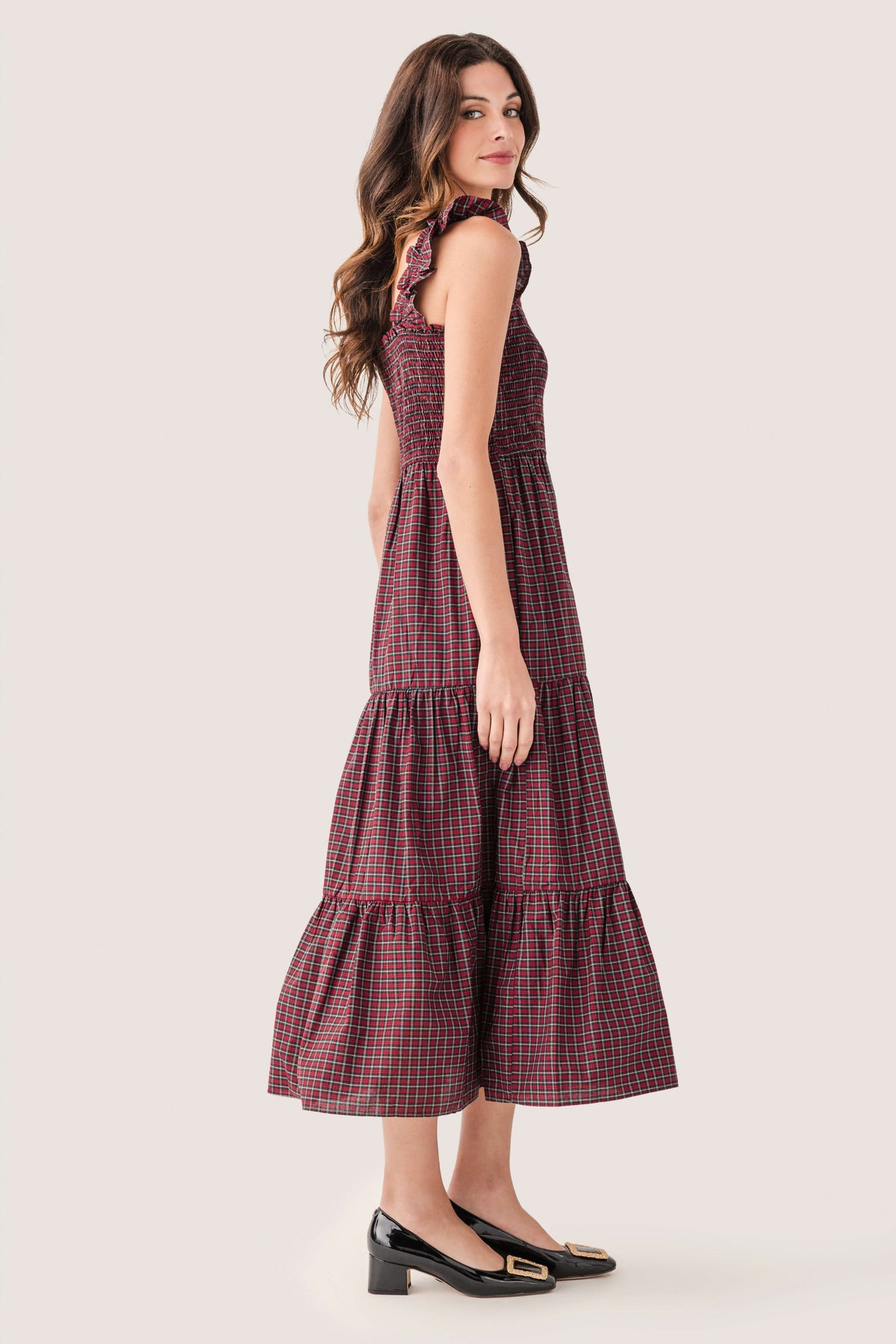 Red and green tartan smocked midi dress with tiered skirt and cap sleeves