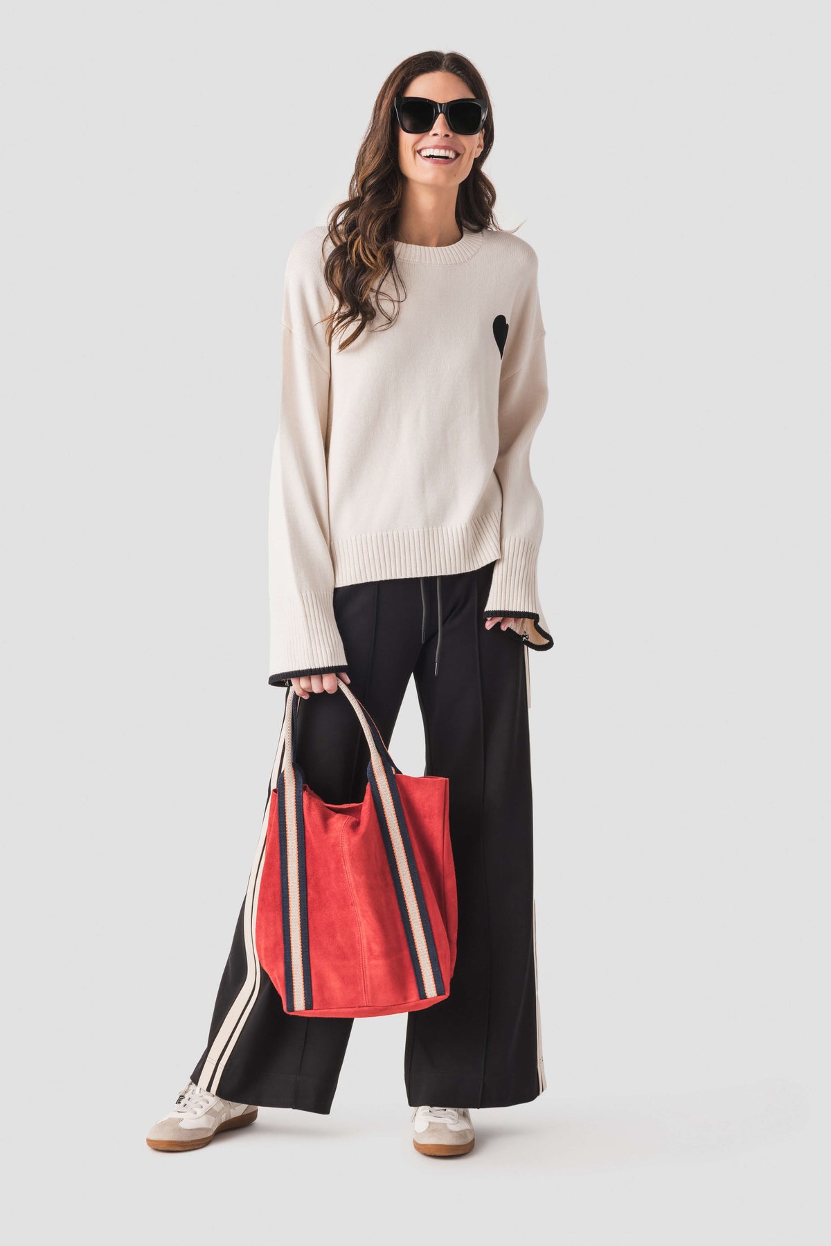 Red suede leather tote bag with striped trim and top open mouth