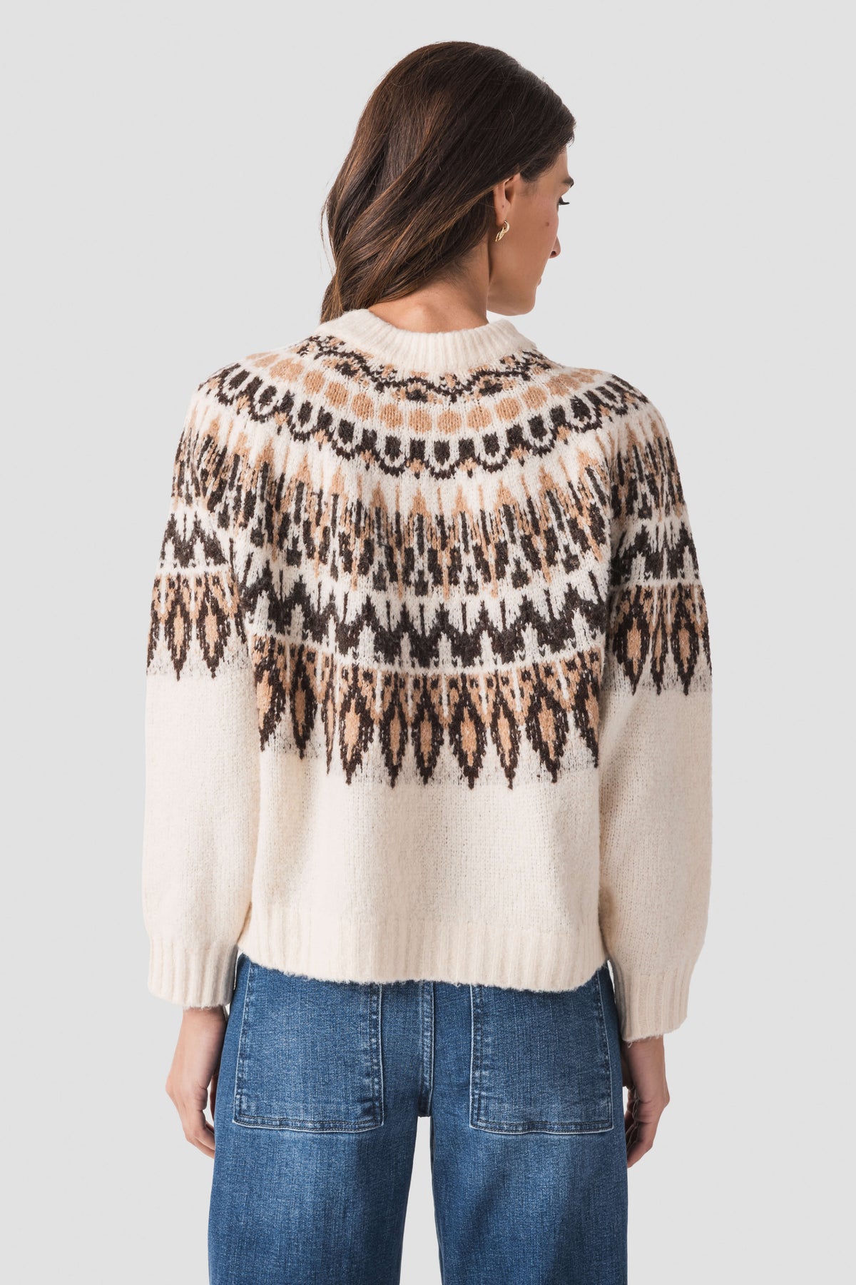 Back view of ivory knit sweater with black and brown Nordic fair isle pattern