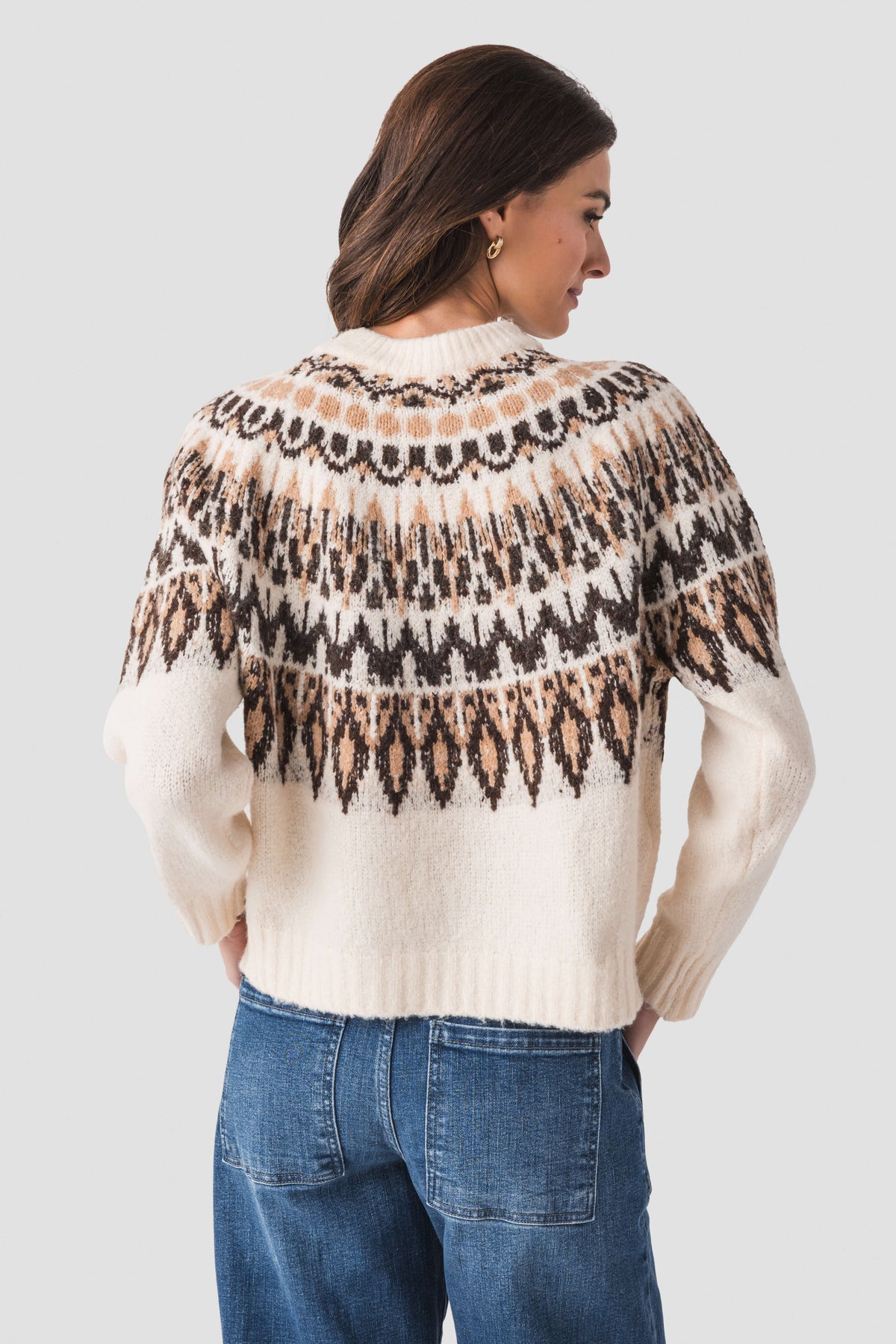 Back view: ivory knit sweater with black and brown Nordic pattern and ribbed hem