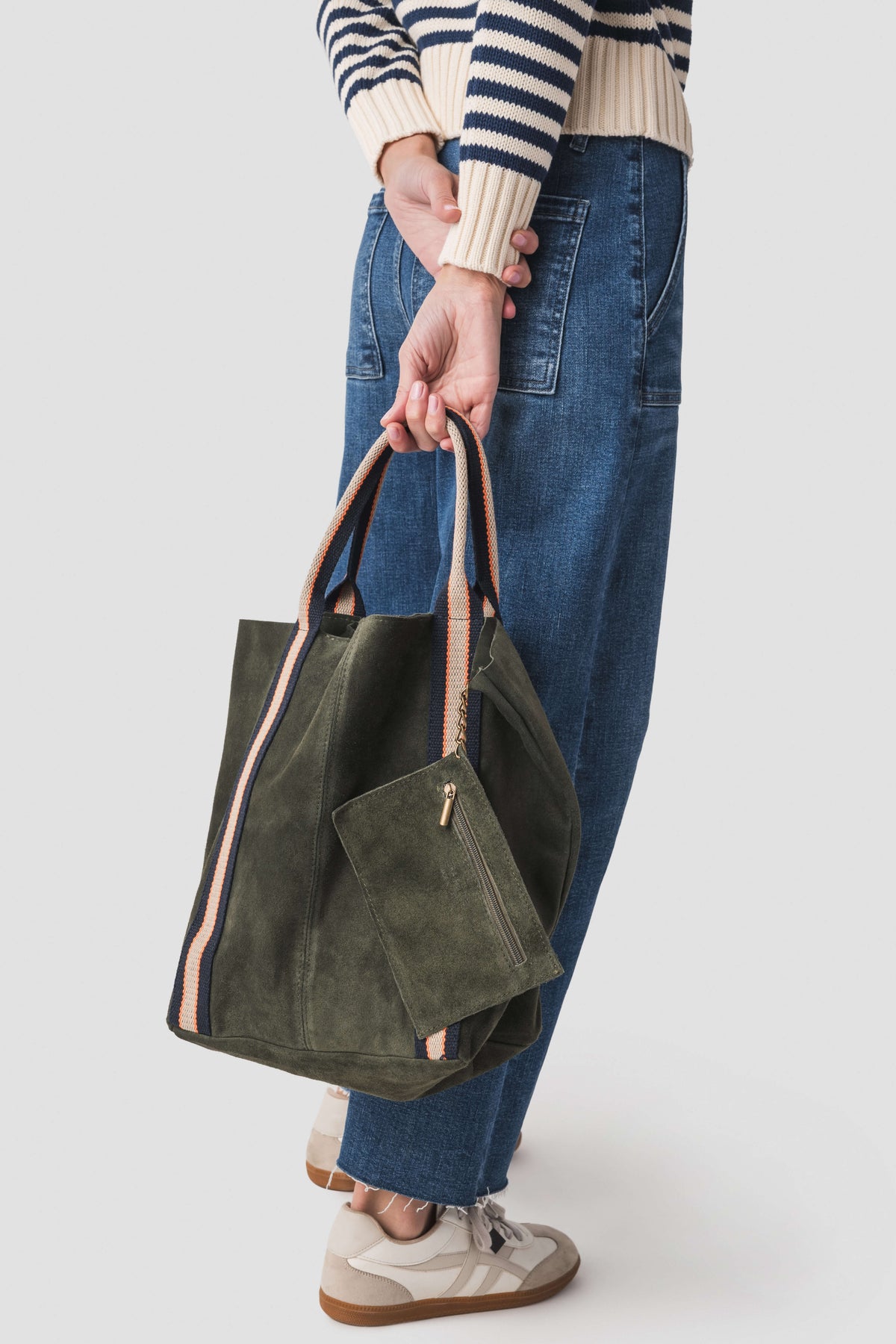 Olive suede leather tote bag with front pocket and striped trim on sides