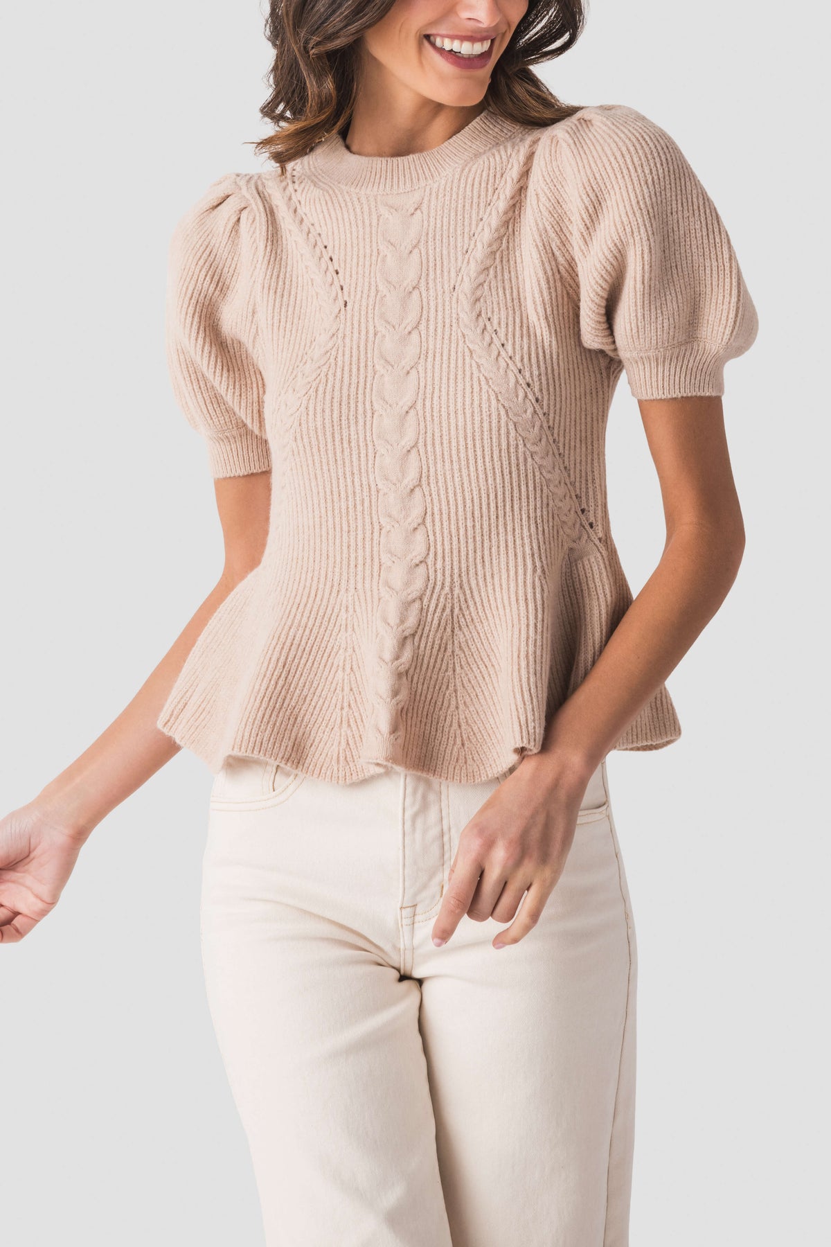 Oatmeal knit top with crew neck, vertical cable stitch, and puff sleeves
