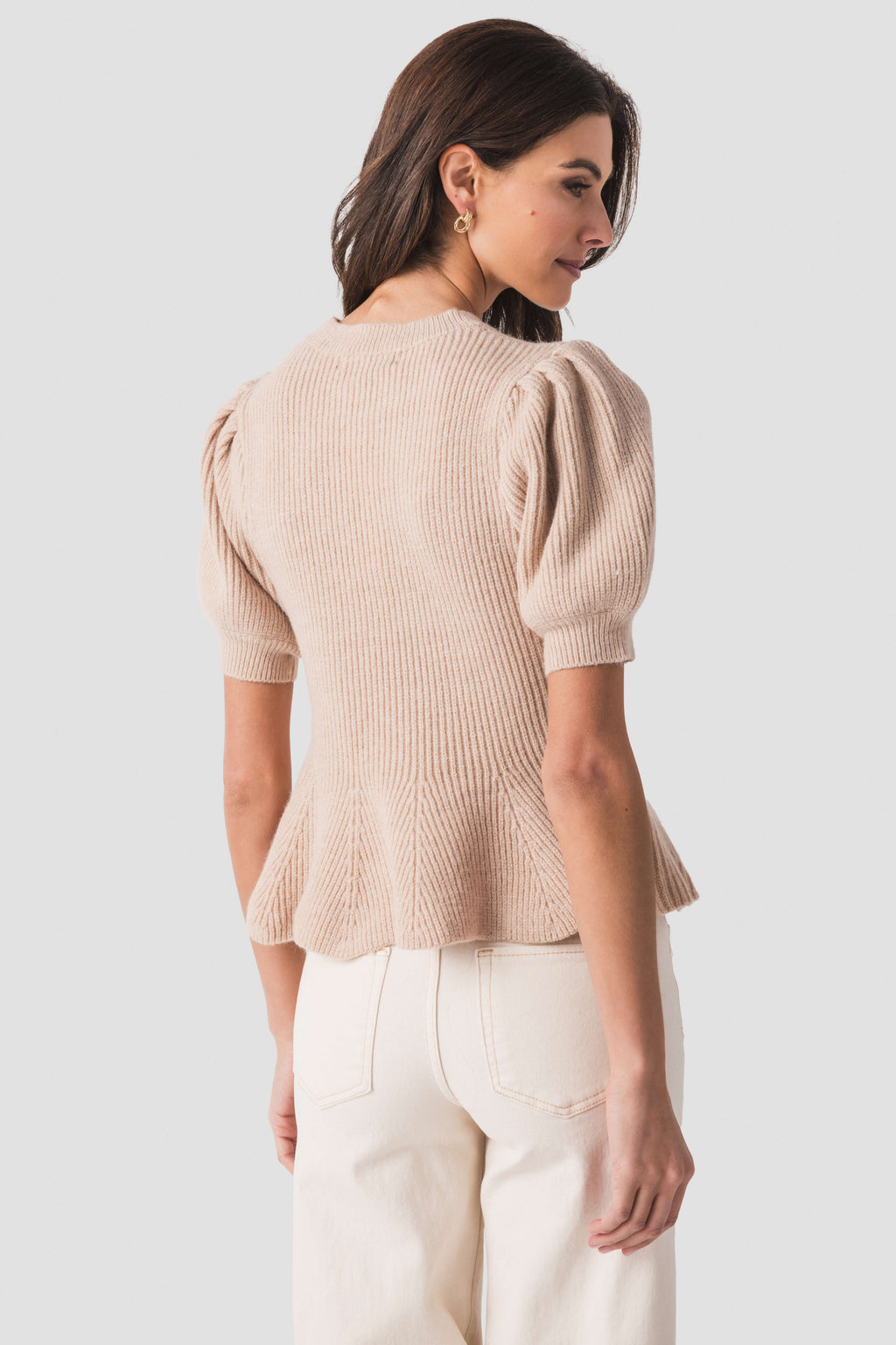 Oatmeal knit top with puff sleeves and flared back hem