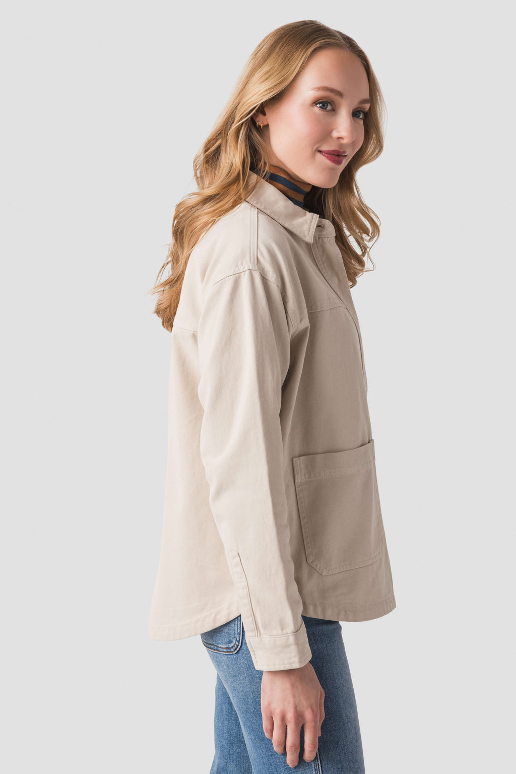 Women’s parchment jacket with shoulder yoke and chest patch pockets, side view