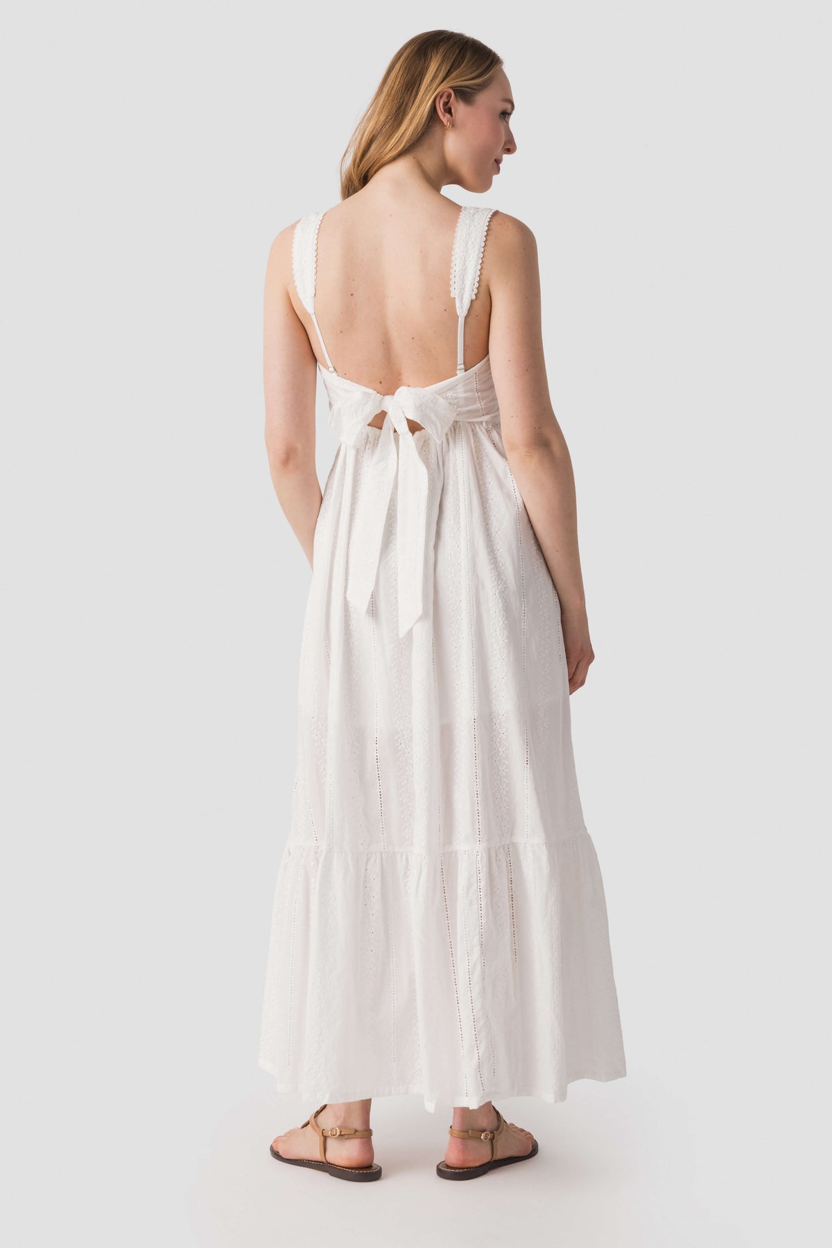 Dress Forum ivory lace maxi dress, open-back with lace straps and bow detail