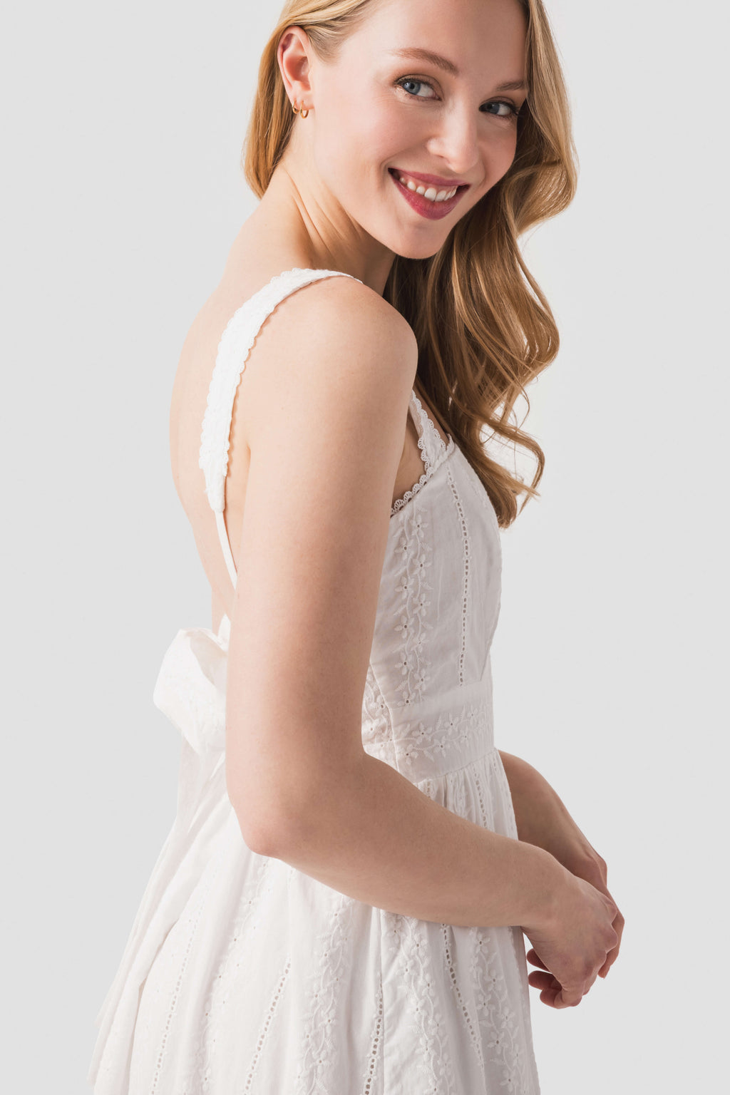 Dress Forum ivory lace maxi dress, close-up side view of lace bodice and straps