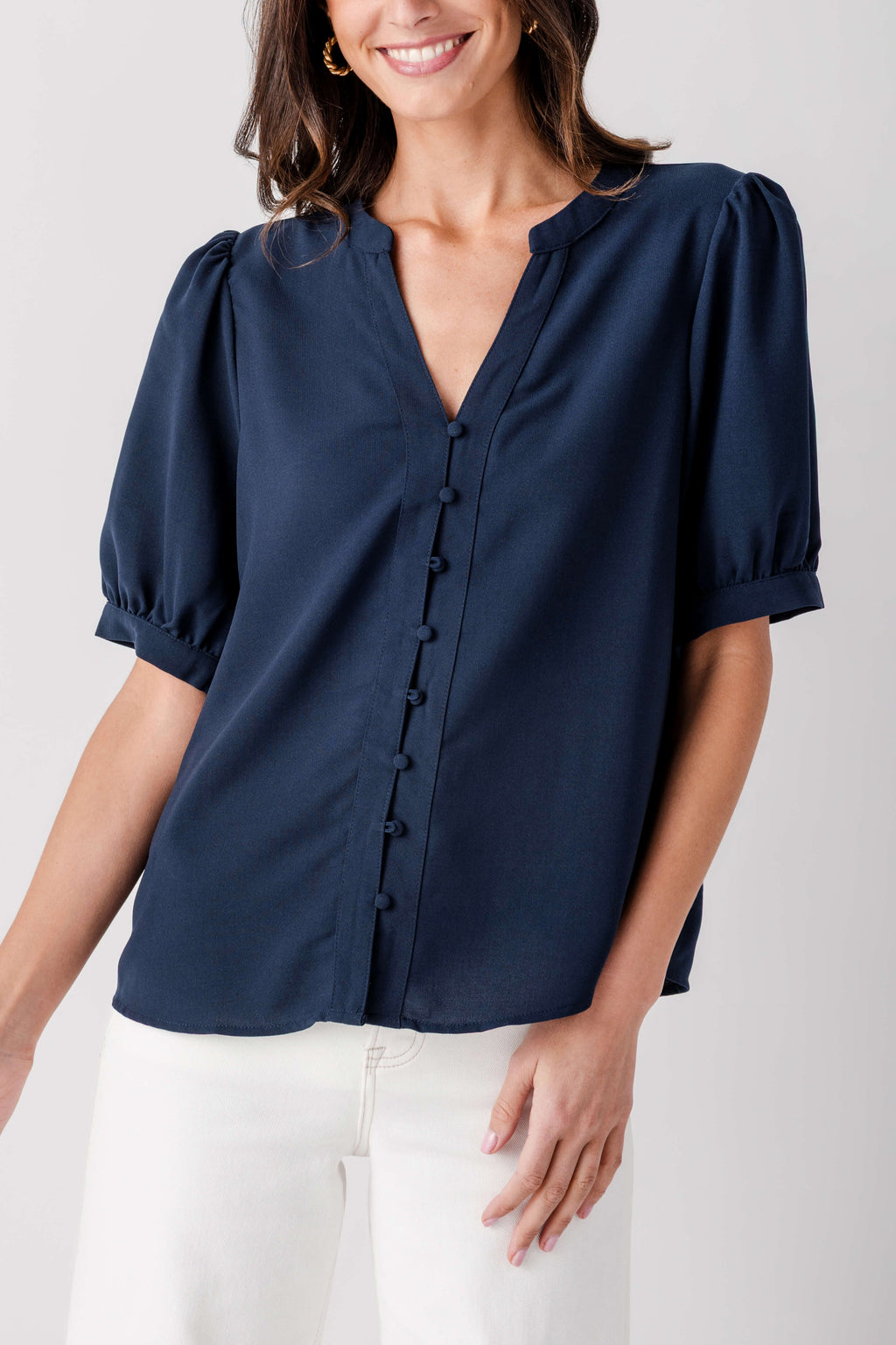 Navy V-neck button-front blouse with puff sleeves