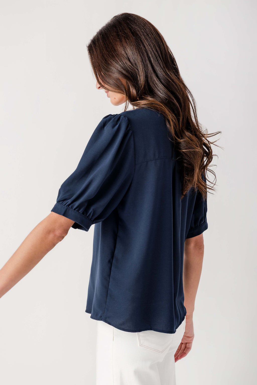Navy puff-sleeve blouse top back view with gathered shoulders