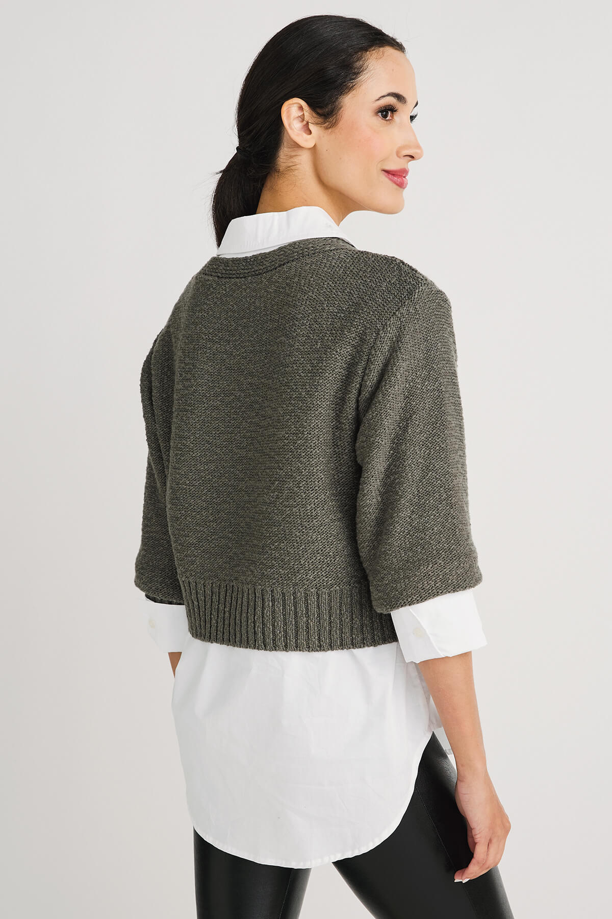 Gunmetal grey cropped knit cardigan sweater, back view with ribbed hem and buttons