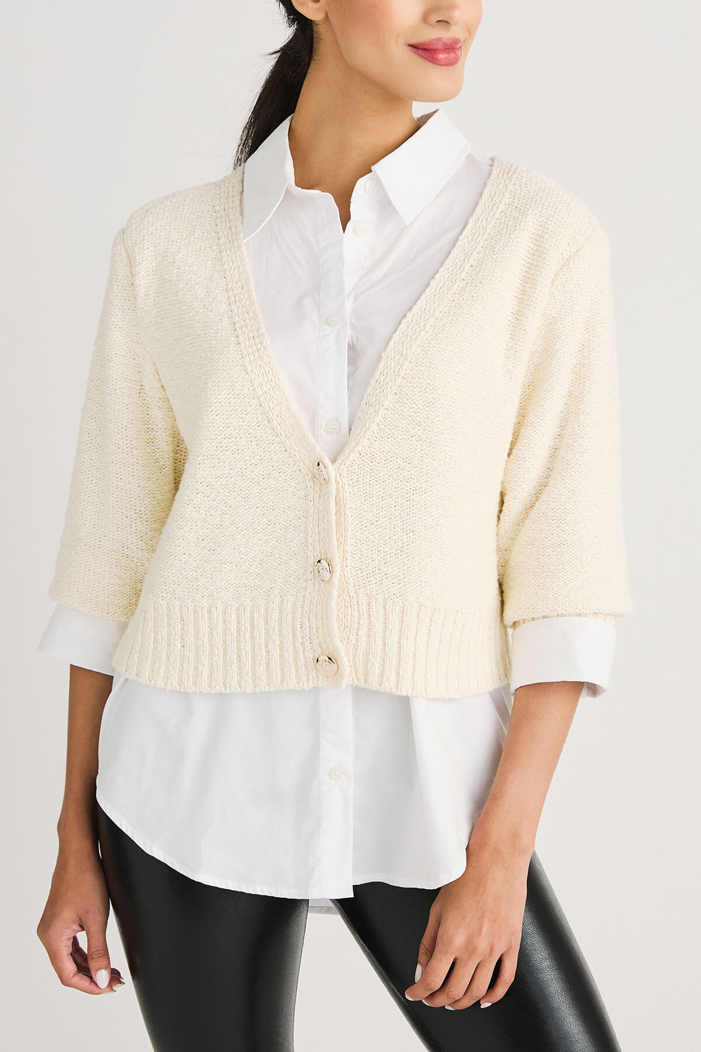 Off-white cropped cardigan sweater front view with V-neck and small button placket