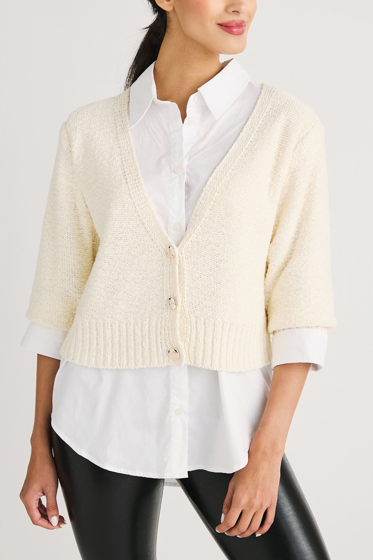 Off-white cropped cardigan sweater front view with V-neck and small button placket