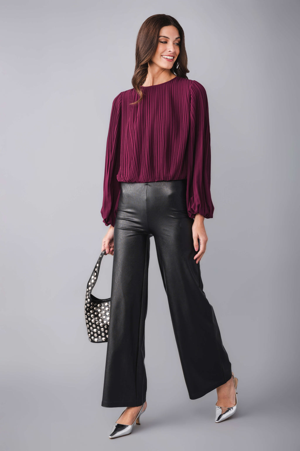 Wine bubble hem top with vertical pleats and long puff sleeves