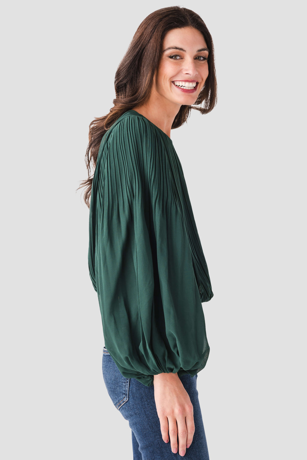 Pine green bubble hem top with vertical pleats and long balloon sleeves