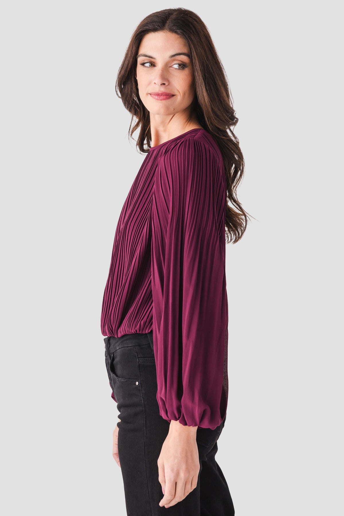 Wine bubble hem top with vertical pleats and long balloon sleeves