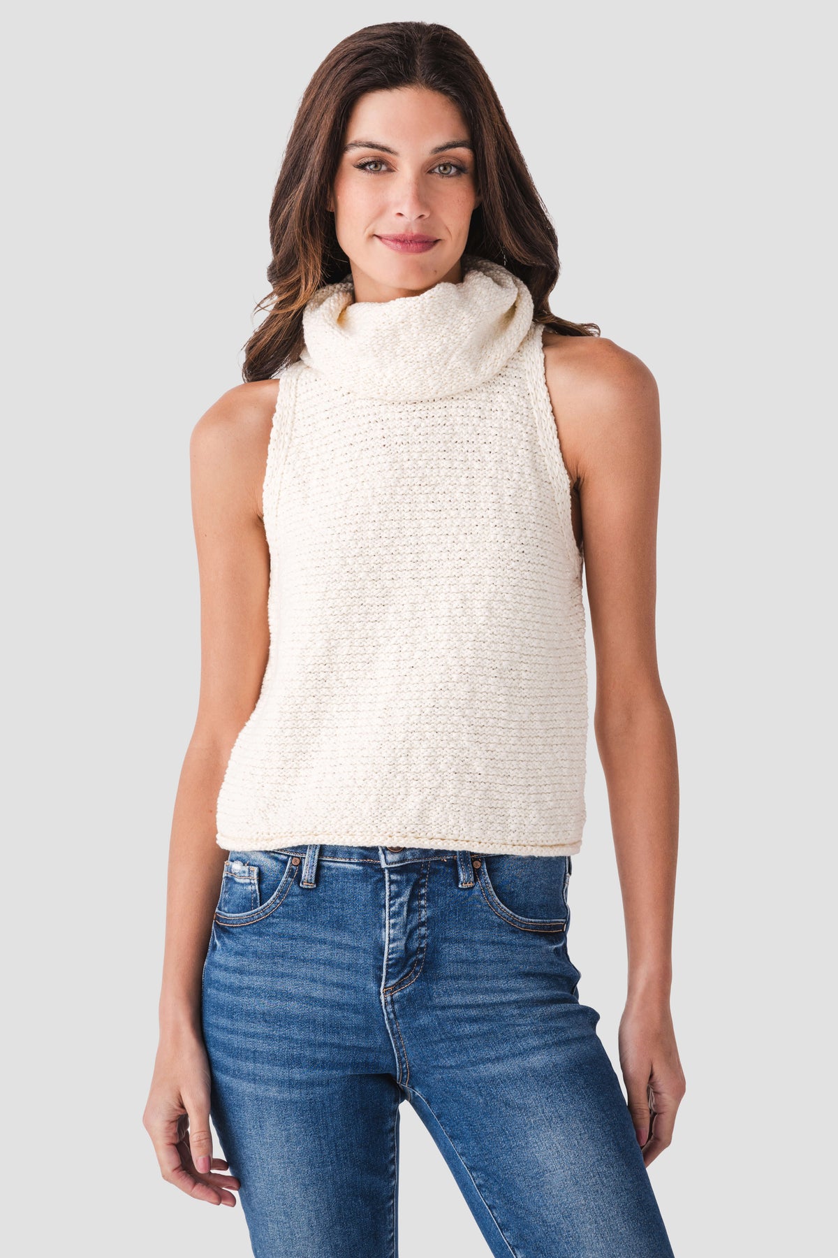 Ivory sleeveless textured knit top with high mock turtleneck