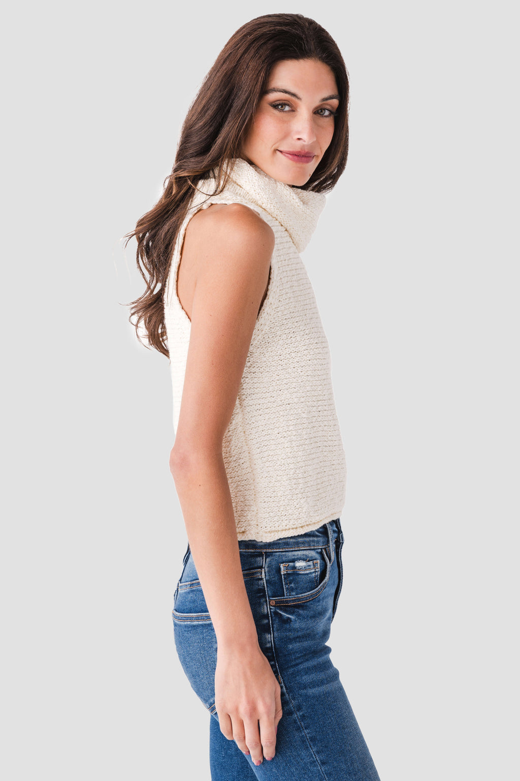 Ivory sleeveless knit top with high cowl neckline