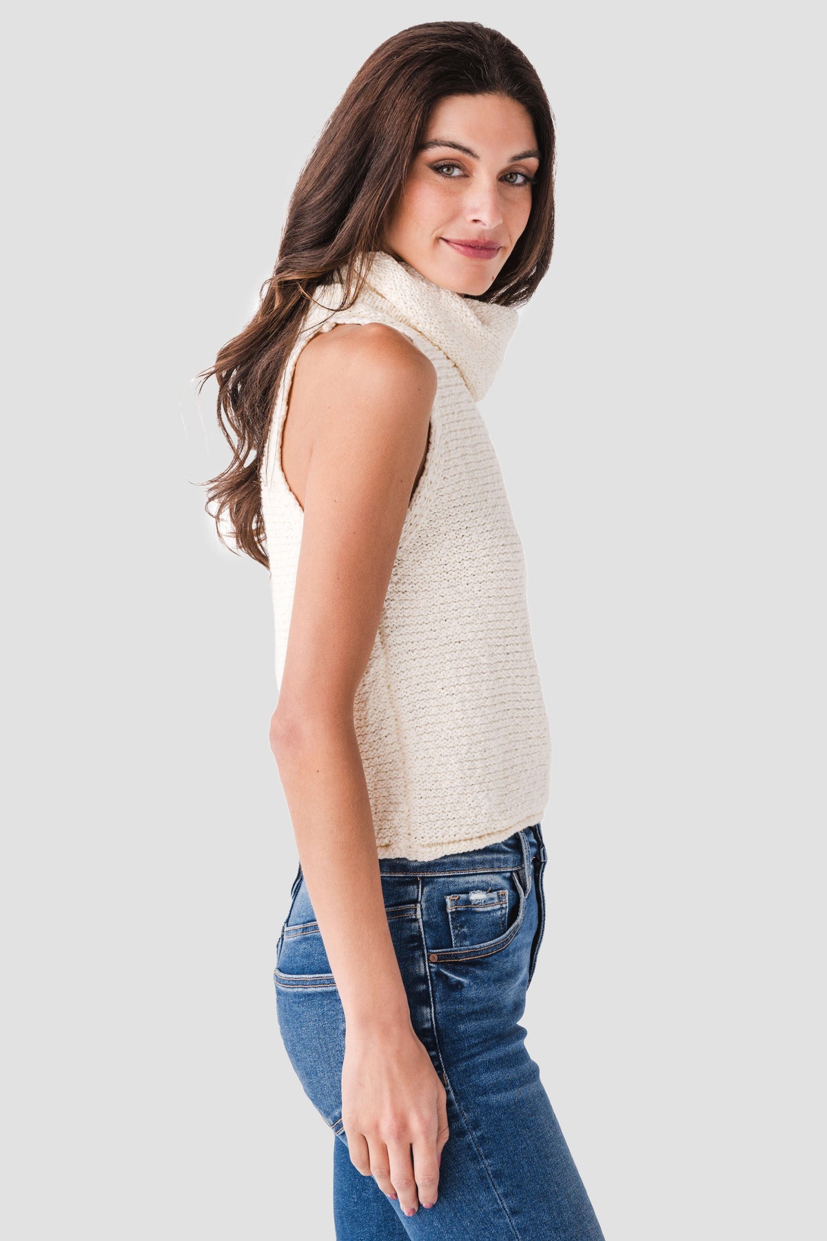 Ivory sleeveless knit top with high cowl neckline