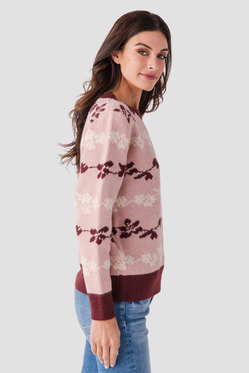 Floral jacquard knit pullover in mute rose with maroon bow stripe pattern, crewneck