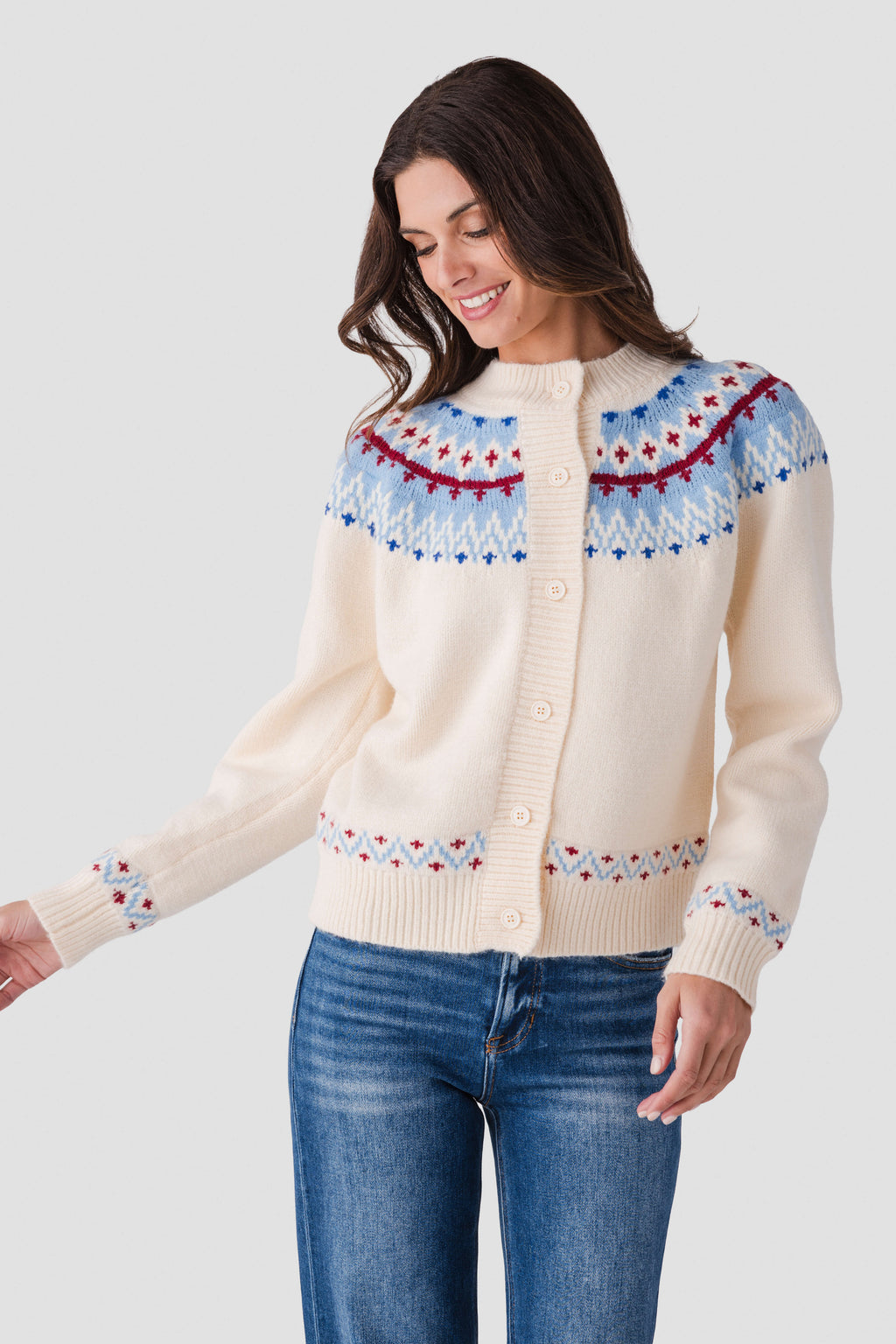 Ivory button-front cardigan with fair isle yoke, ribbed cuffs, and colorful trim