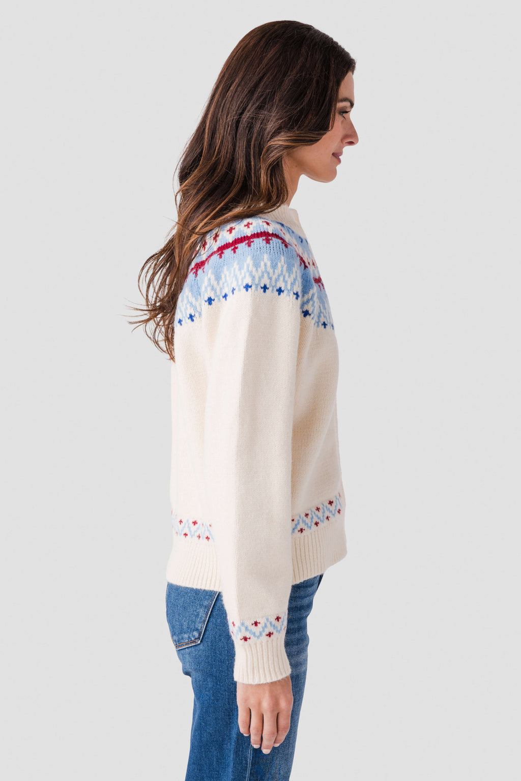 Ivory cardigan back with blue and red fair isle yoke and patterned cuff trim