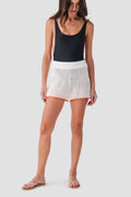 White crochet contrast shorts with orange-trimmed edges and elastic waist