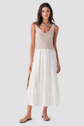 Light sleeveless maxi dress with scoop neck, textured bodice, and tiered skirt
