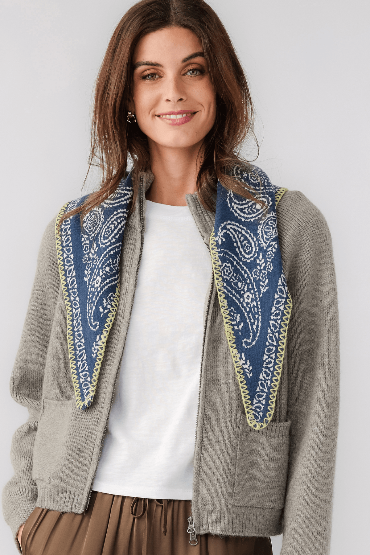Denim blue knitted triangle scarf with ornate border trim