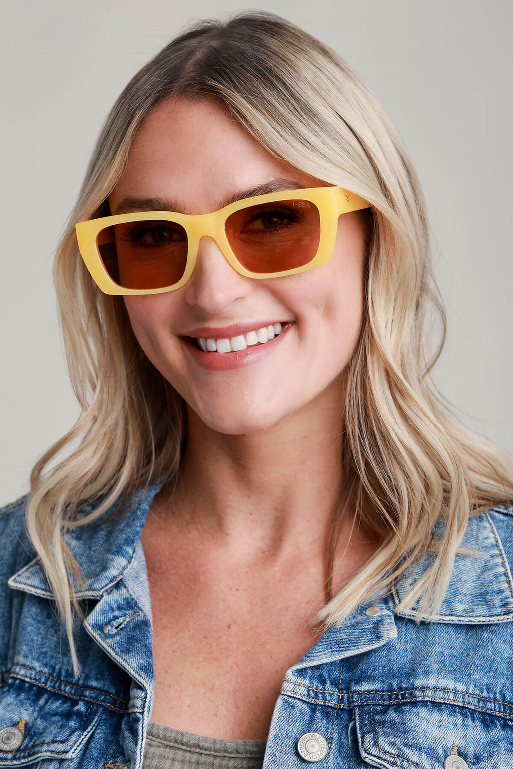 I-Sea Sonic sunglasses with yellow square frames and amber tinted lenses