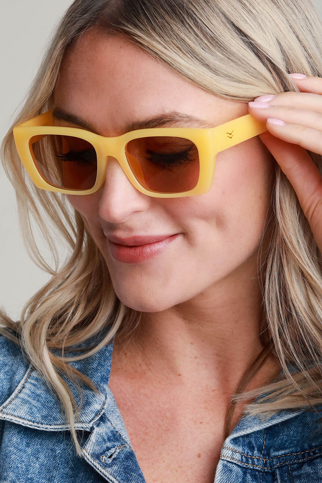 I-Sea Sonic sunglasses, yellow frames with amber lenses, logo on temple